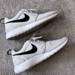 Nike White Sneakers with Black Swoosh